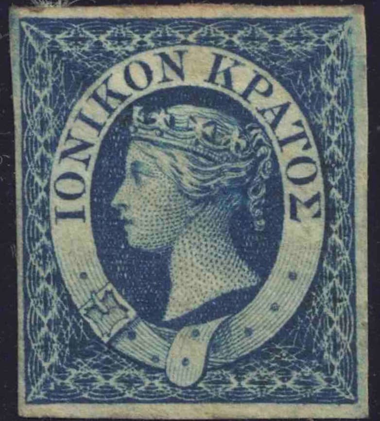 Traditional stamp album pages with mounted collections